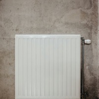 White panel radiator mounted on a wall